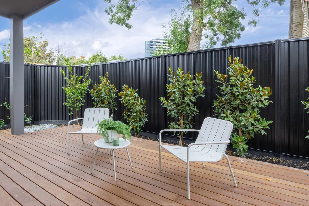 A deck and courtyard photographed in daylight